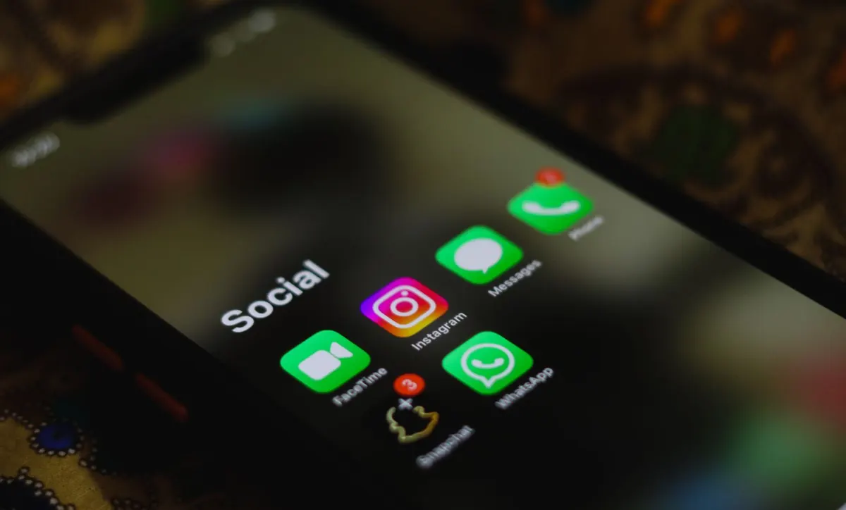 A phone screen showing a grid of social media app icons.